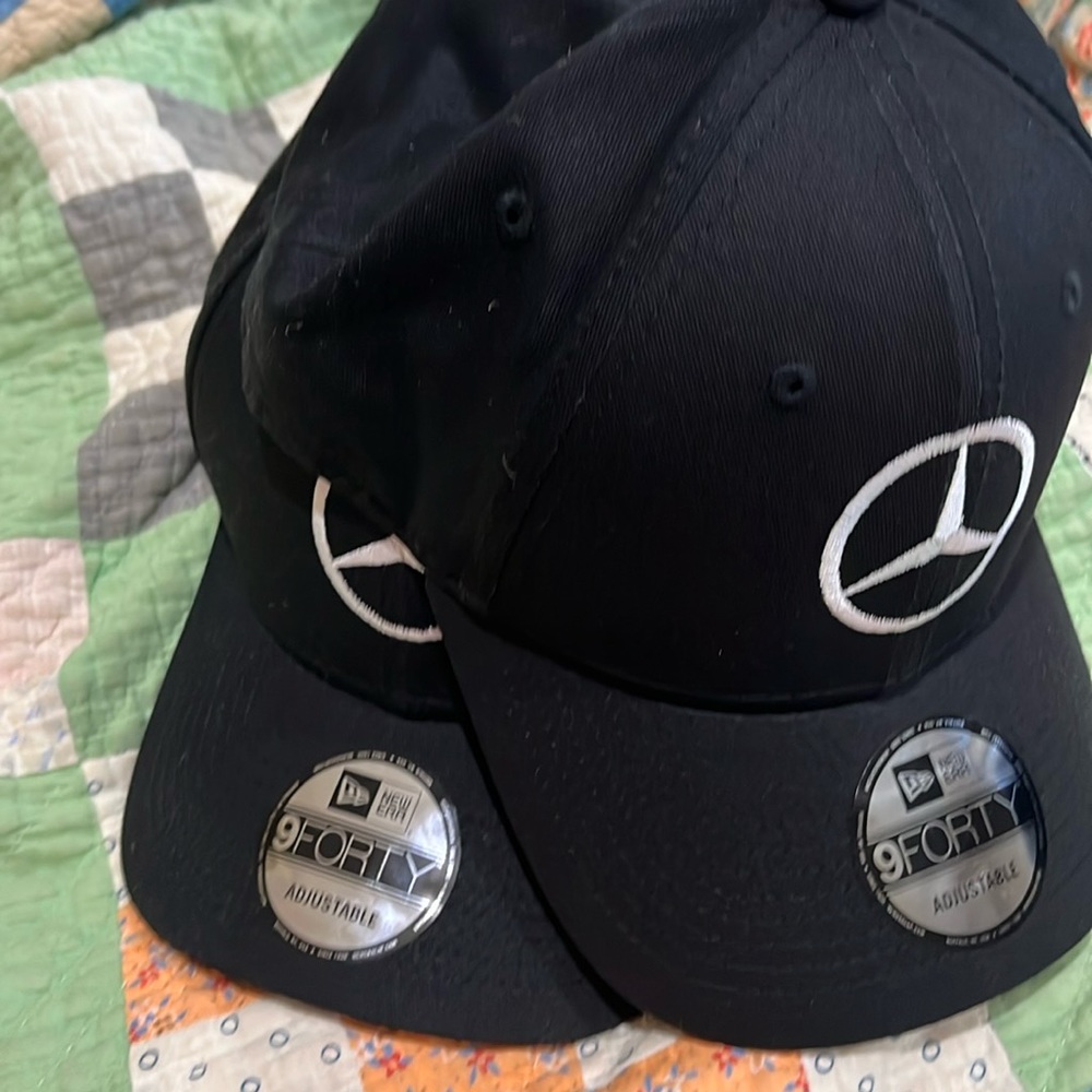 Mercedes ball caps. Two hats are included. Brand new, nice color and shape.